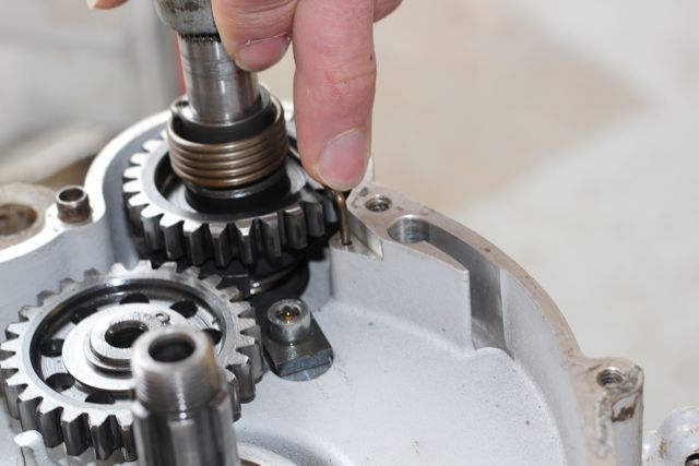Placing the assembly and spring in the correct position